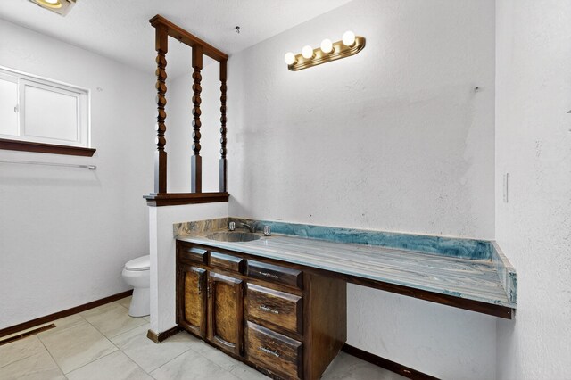 10017 Boulder St NW, Albuquerque, NM 87114 - bathroom featuring toilet and vanity