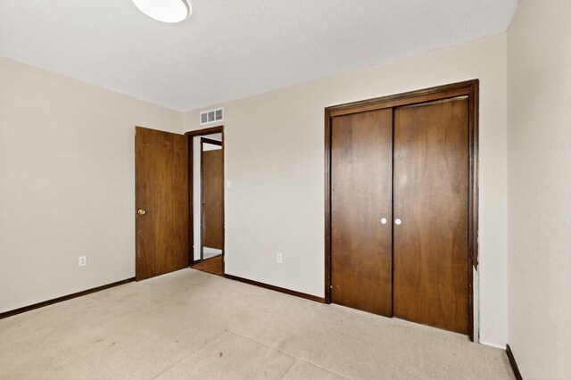 10017 Boulder St NW, Albuquerque, NM 87114 - unfurnished bedroom featuring carpet floors and a closet