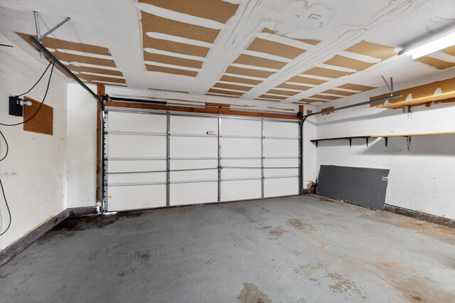 10017 Boulder St NW, Albuquerque, NM 87114 - garage featuring baseboards