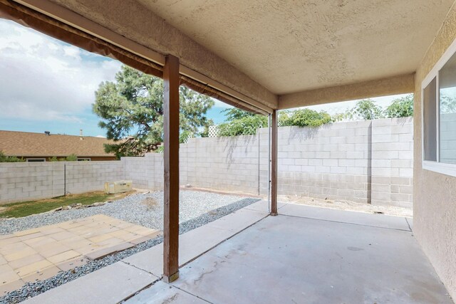 10017 Boulder St NW, Albuquerque, NM 87114 - fenced backyard with a patio area