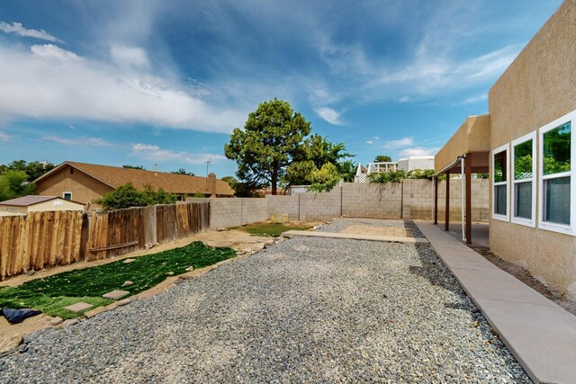10017 Boulder St NW, Albuquerque, NM 87114 - fenced backyard with a patio