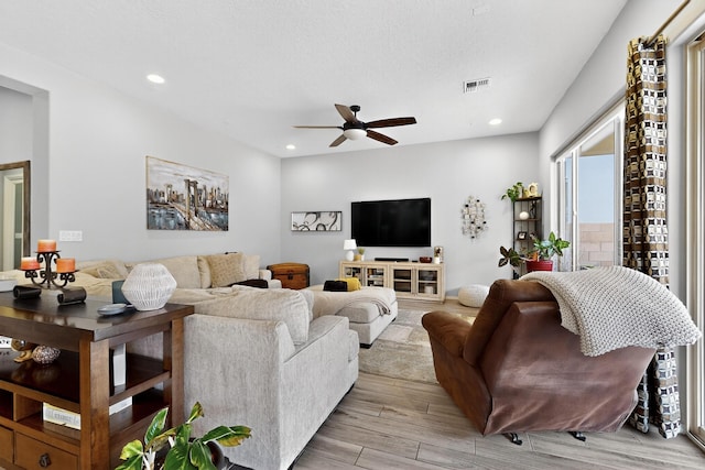 4028 Colina Roja Ln NE, Rio Rancho, NM 87124 - living room with light wood-style floors, a ceiling fan, recessed lighting, and plenty of natural light
