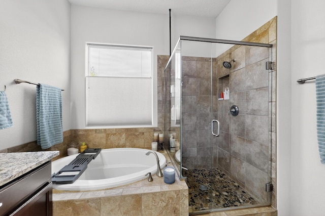 4028 Colina Roja Ln NE, Rio Rancho, NM 87124 - bathroom with a bath, a shower stall, and vanity