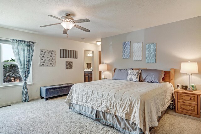 12323 Haines Ave NE, Albuquerque, NM 87112 - carpeted bedroom with a textured ceiling, baseboards, and ceiling fan