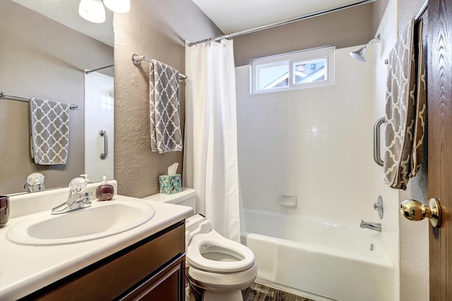 12323 Haines Ave NE, Albuquerque, NM 87112 - full bath with shower / bath combination with curtain, toilet, vanity, and a textured wall