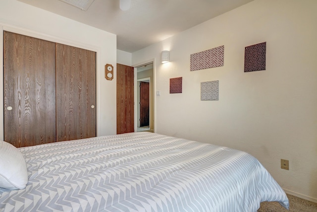 12323 Haines Ave NE, Albuquerque, NM 87112 - bedroom featuring a closet, ceiling fan, and carpet flooring