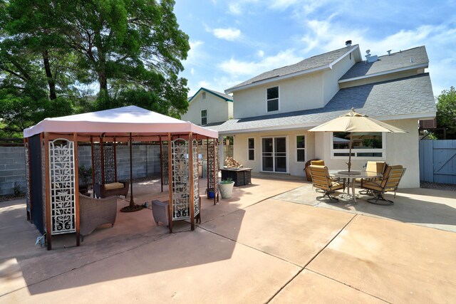12323 Haines Ave NE, Albuquerque, NM 87112 - view of patio featuring a gazebo and an outdoor hangout area