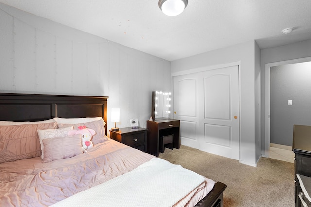 8031 Corn Mountain Pl NW, Albuquerque, NM 87114 - bedroom featuring a closet and light carpet