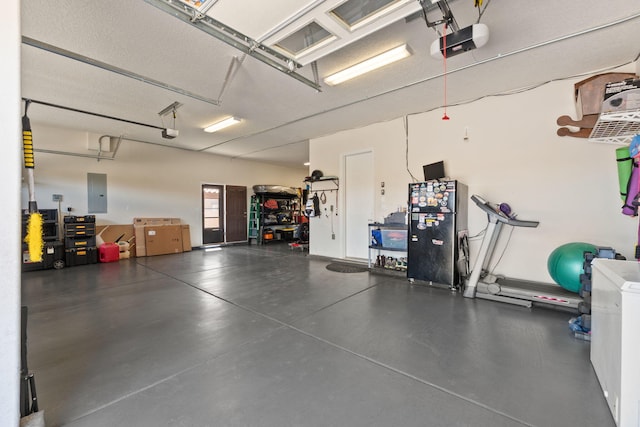 4118 Pico Norte Ln NE, Rio Rancho, NM 87124 - garage featuring electric panel and a garage door opener