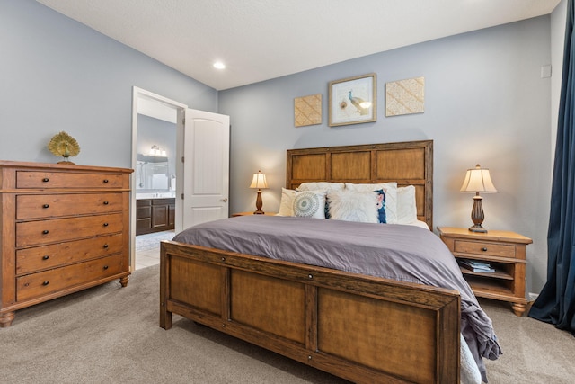 4118 Pico Norte Ln NE, Rio Rancho, NM 87124 - bedroom featuring light carpet, ensuite bath, and recessed lighting