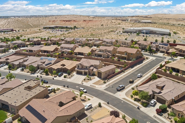 4118 Pico Norte Ln NE, Rio Rancho, NM 87124 - aerial perspective of suburban area featuring a mountainous background and a desert landscape