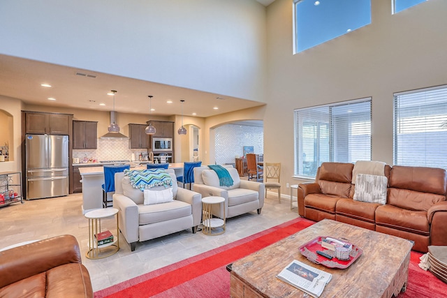 2350 Sandra Loop NE, Rio Rancho, NM 87144 - living area featuring recessed lighting and arched walkways