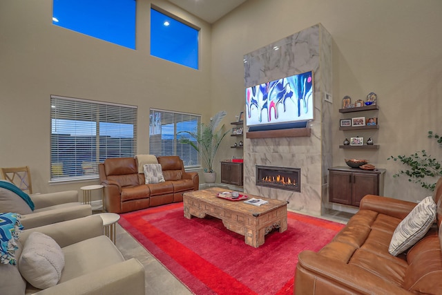 2350 Sandra Loop NE, Rio Rancho, NM 87144 - living room with a premium fireplace and a towering ceiling