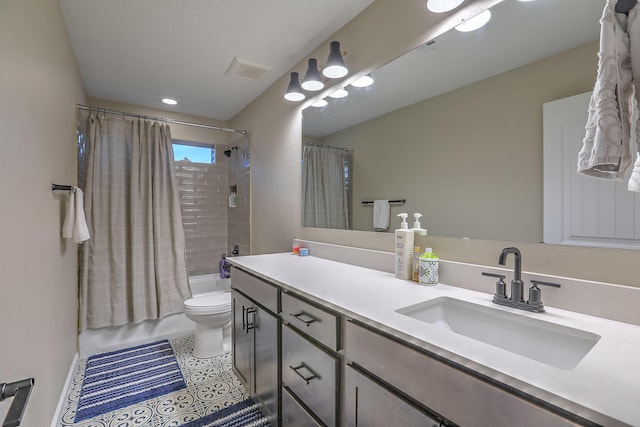 2350 Sandra Loop NE, Rio Rancho, NM 87144 - bathroom featuring vanity, toilet, shower / bath combo with shower curtain, and recessed lighting