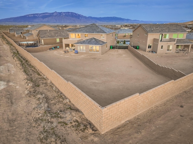 2350 Sandra Loop NE, Rio Rancho, NM 87144 - view of pool with a mountain view and a fenced backyard