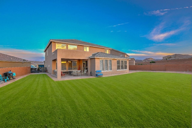 2350 Sandra Loop NE, Rio Rancho, NM 87144 - rear view of house featuring stucco siding, a patio, and central AC