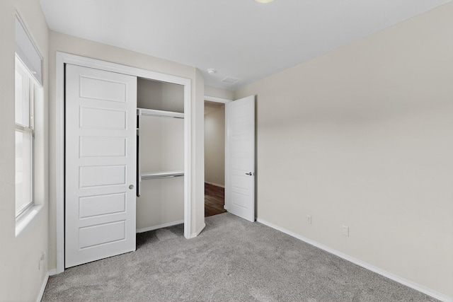 215 Adeline Ave, Los Lunas, NM 87031 - unfurnished bedroom featuring carpet and a closet