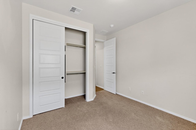 275 Adeline Ave, Los Lunas, NM 87031 - unfurnished bedroom featuring carpet floors and a closet