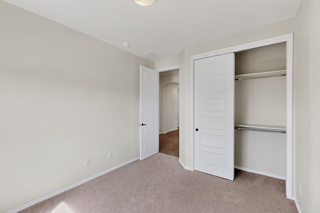 275 Adeline Ave, Los Lunas, NM 87031 - unfurnished bedroom featuring carpet flooring and a closet