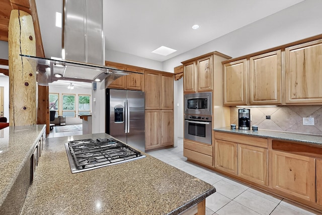 317 Plaza Muchomas, Bernalillo, NM 87004 - kitchen featuring stainless steel appliances, decorative backsplash, light brown cabinetry, stone countertops, and recessed lighting