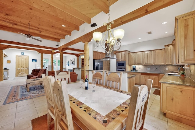 317 Plaza Muchomas, Bernalillo, NM 87004 - dining area with light tile patterned floors, ceiling fan, beam ceiling, recessed lighting, and a chandelier