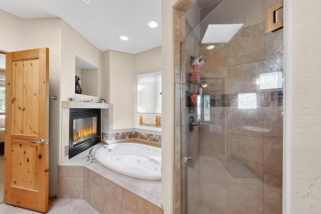 317 Plaza Muchomas, Bernalillo, NM 87004 - bathroom featuring a whirlpool tub, a stall shower, a fireplace, and vanity