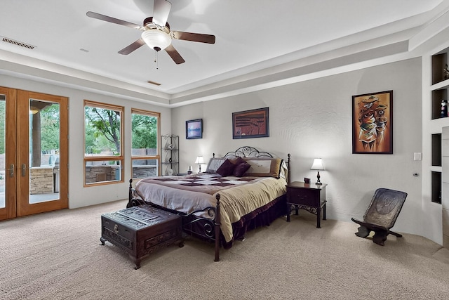 317 Plaza Muchomas, Bernalillo, NM 87004 - bedroom featuring carpet floors, access to outside, french doors, and ceiling fan