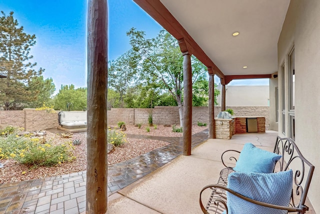317 Plaza Muchomas, Bernalillo, NM 87004 - fenced backyard with a patio area