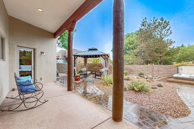 317 Plaza Muchomas, Bernalillo, NM 87004 - fenced backyard featuring a gazebo and a patio