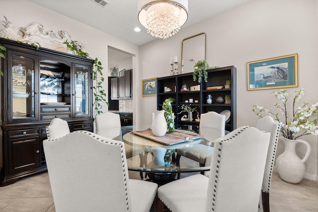 9128 Vista Bosquejo Rd NW, Albuquerque, NM 87120 - dining area featuring a chandelier, light tile patterned floors, and recessed lighting