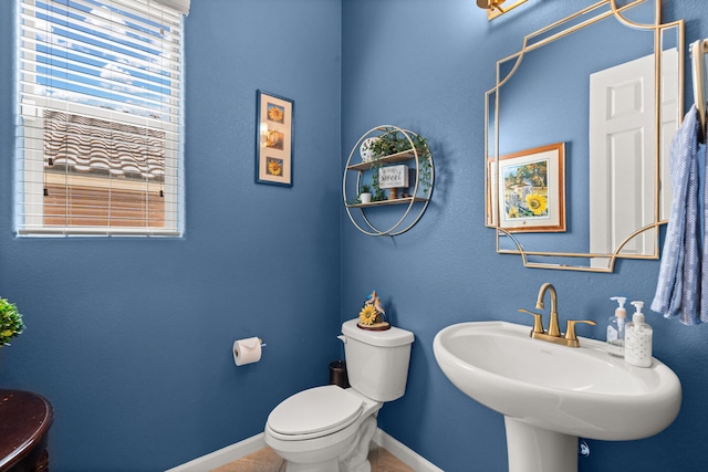 9128 Vista Bosquejo Rd NW, Albuquerque, NM 87120 - half bathroom with toilet and tile patterned flooring