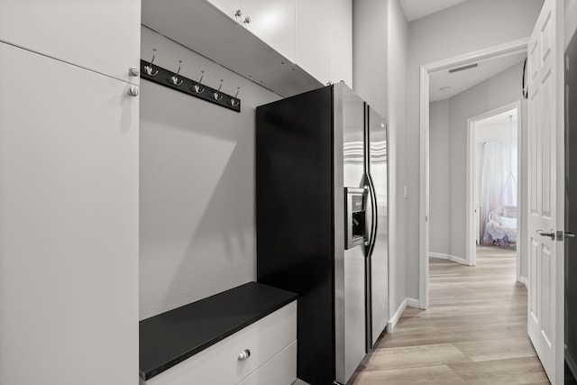 9128 Vista Bosquejo Rd NW, Albuquerque, NM 87120 - mudroom with light wood-style floors and baseboards