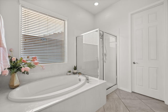 9128 Vista Bosquejo Rd NW, Albuquerque, NM 87120 - bathroom with a stall shower, a garden tub, and tile patterned flooring