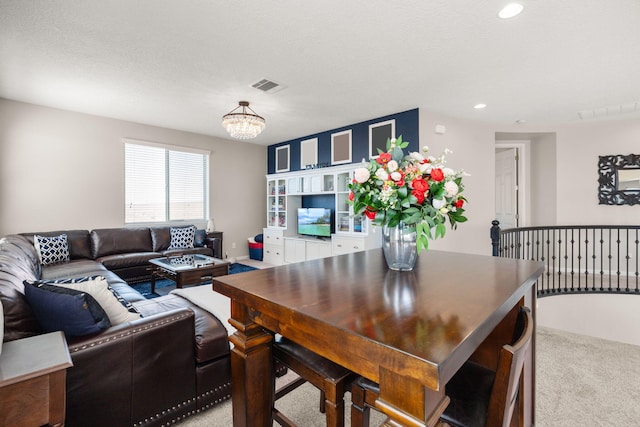 9128 Vista Bosquejo Rd NW, Albuquerque, NM 87120 - living area featuring light colored carpet, a chandelier, and recessed lighting