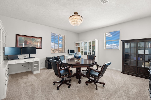 9128 Vista Bosquejo Rd NW, Albuquerque, NM 87120 - office space with light carpet, a chandelier, and a textured ceiling