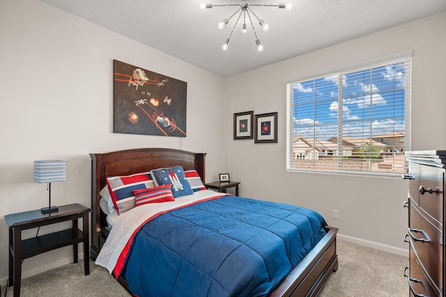 9128 Vista Bosquejo Rd NW, Albuquerque, NM 87120 - bedroom featuring carpet flooring and a chandelier