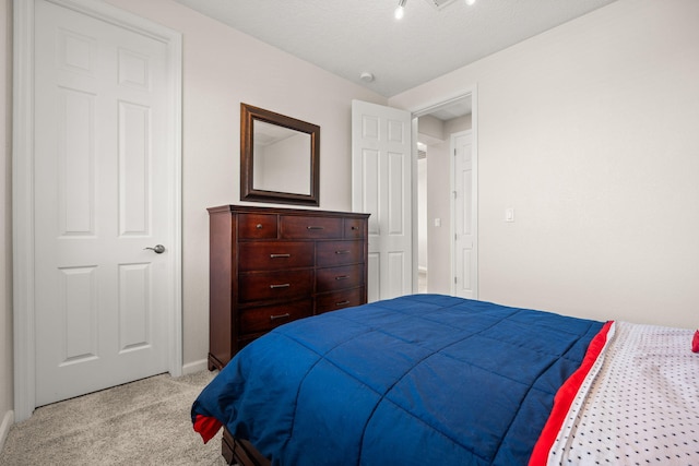 9128 Vista Bosquejo Rd NW, Albuquerque, NM 87120 - bedroom featuring light carpet and baseboards