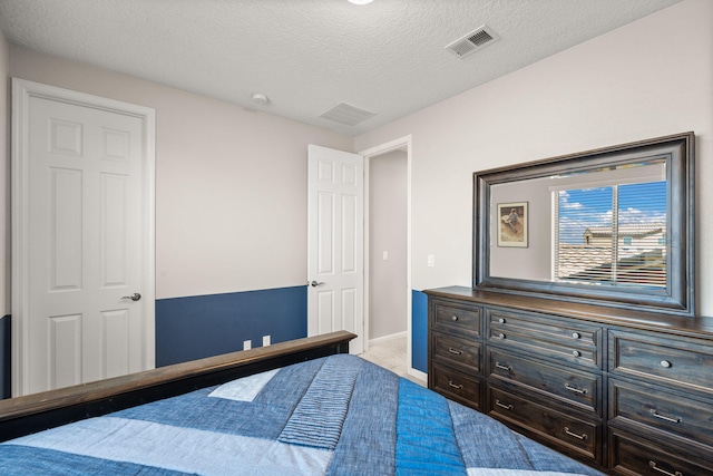 9128 Vista Bosquejo Rd NW, Albuquerque, NM 87120 - bedroom featuring carpet floors and a textured ceiling