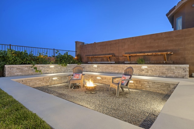 9128 Vista Bosquejo Rd NW, Albuquerque, NM 87120 - view of patio / terrace with a fire pit