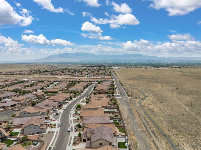 9128 Vista Bosquejo Rd NW, Albuquerque, NM 87120 - aerial perspective of suburban area with mountains