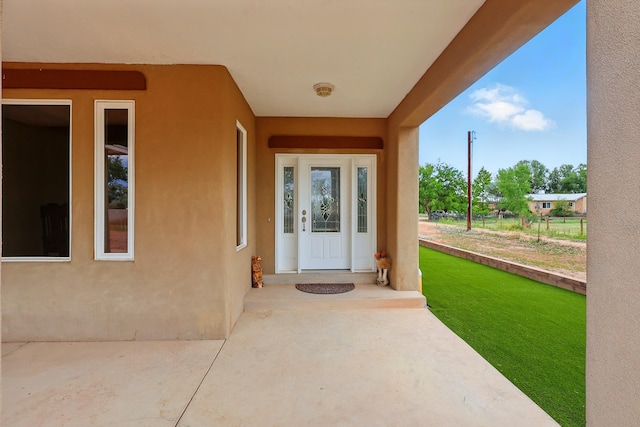2061 Blaylock Ln NE, Los Lunas, NM 87031 - entrance to property featuring stucco siding