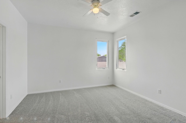 2061 Blaylock Ln NE, Los Lunas, NM 87031 - carpeted spare room featuring a ceiling fan and baseboards