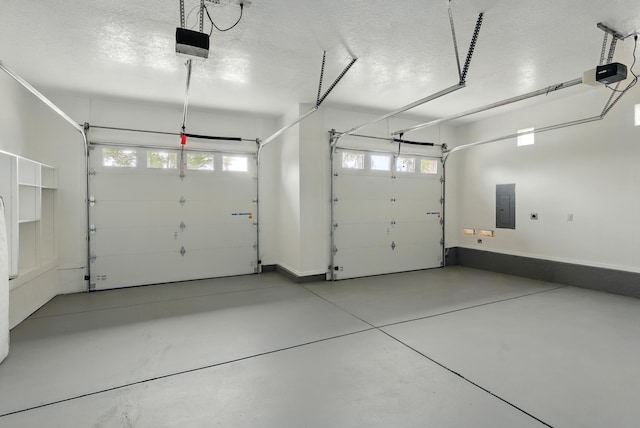 2061 Blaylock Ln NE, Los Lunas, NM 87031 - garage featuring electric panel and a garage door opener