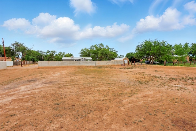 2061 Blaylock Ln NE, Los Lunas, NM 87031 - view of yard featuring a storage shed