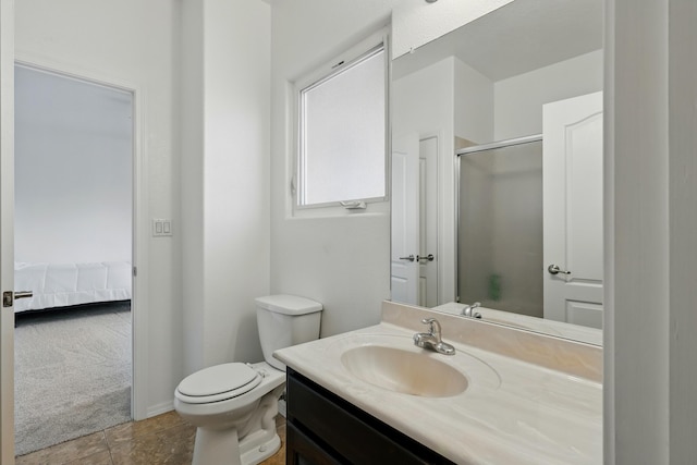 2061 Blaylock Ln NE, Los Lunas, NM 87031 - ensuite bathroom with a shower stall, vanity, and tile patterned floors
