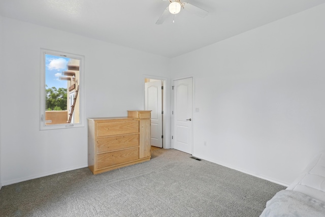 2061 Blaylock Ln NE, Los Lunas, NM 87031 - unfurnished bedroom featuring light colored carpet and ceiling fan