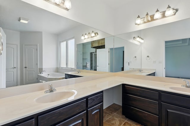 2061 Blaylock Ln NE, Los Lunas, NM 87031 - full bathroom with double vanity and a garden tub