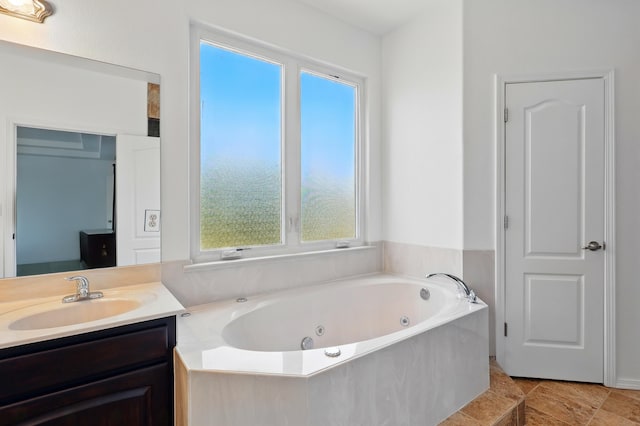 2061 Blaylock Ln NE, Los Lunas, NM 87031 - full bathroom with vanity and a jetted tub