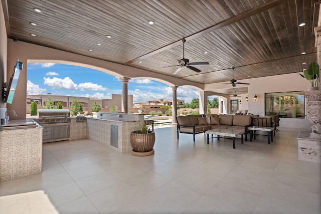 10650 Signal Ave NE, Albuquerque, NM 87122 - view of patio / terrace featuring an outdoor living space, a sink, and a ceiling fan