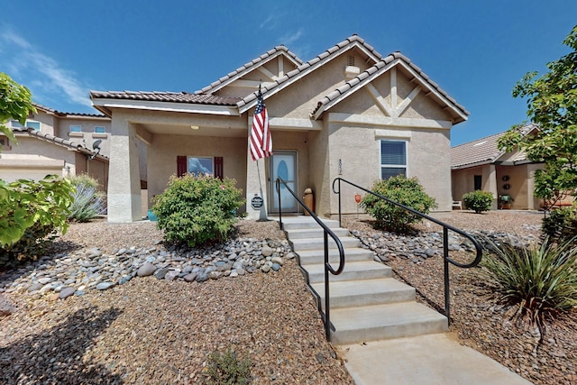 805 Palo Duro Dr, Bernalillo, NM 87004 - view of front facade with stucco siding and a tiled roof